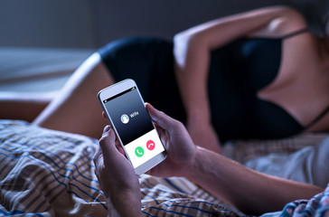 woman in bed and phone that says wife